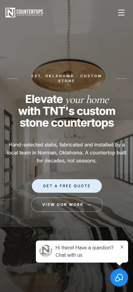 Mobile TNT Countertops homepage with custom stone countertop photography and a Get a Free Quote button