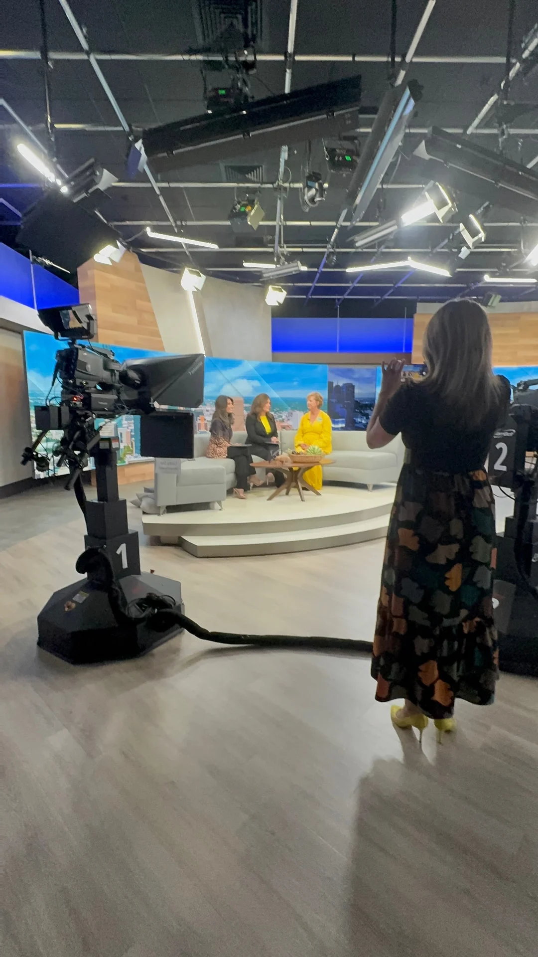 Behind-the-scenes view of a News 9 interview about the Lynn Community Impact launch