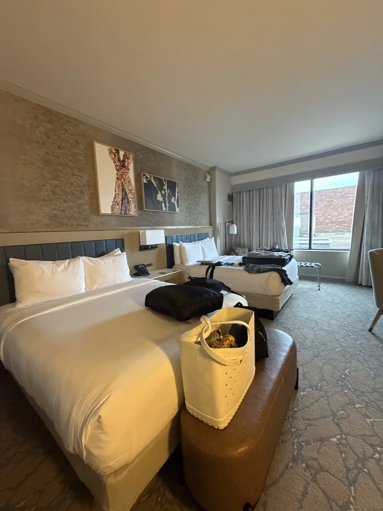 Dallas hotel room with bags unpacked at the start of the LevelUp 2026 conference week
